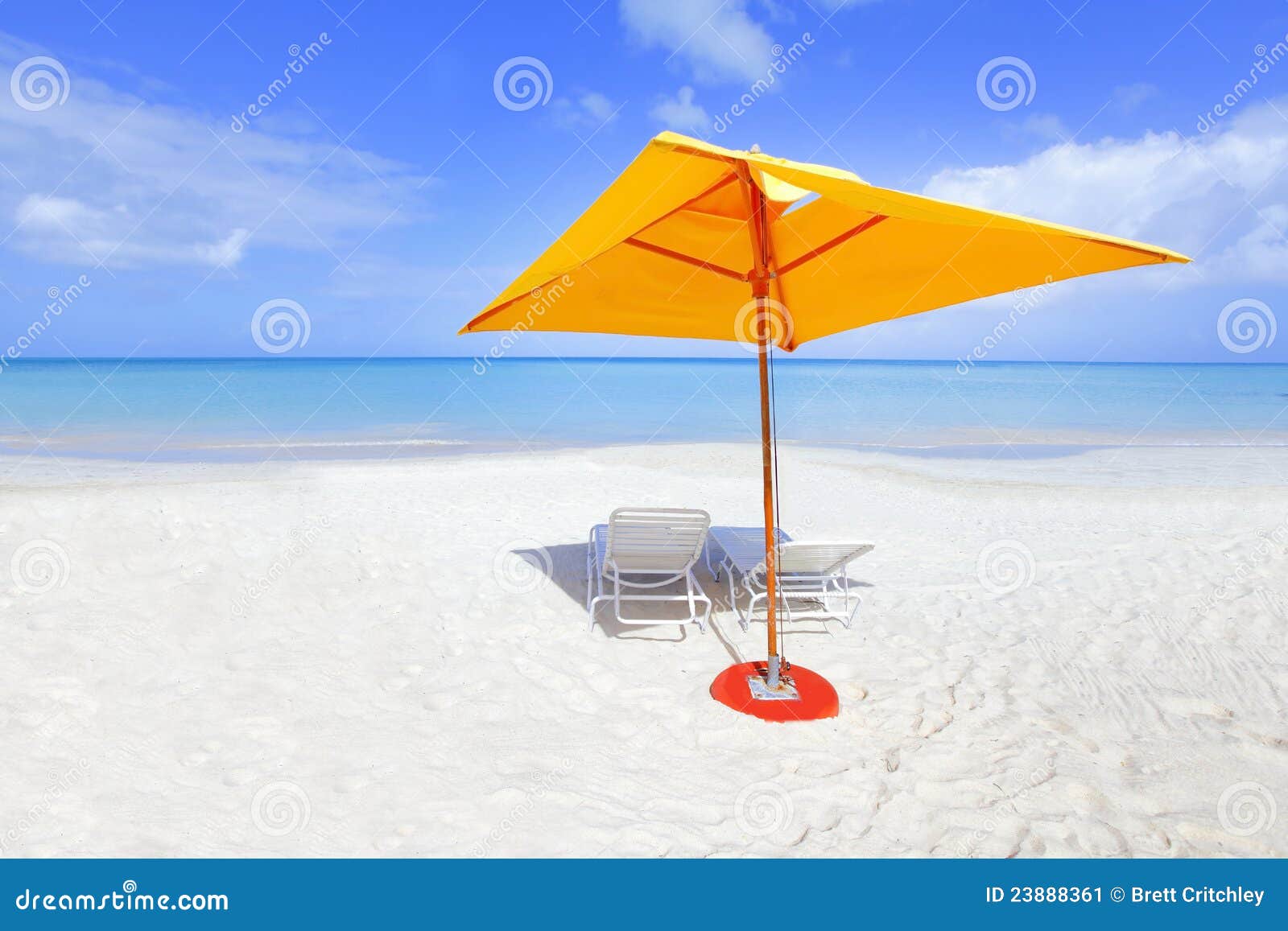 Yellow beach umbrella stock image. Image of sand, chairs 23888361