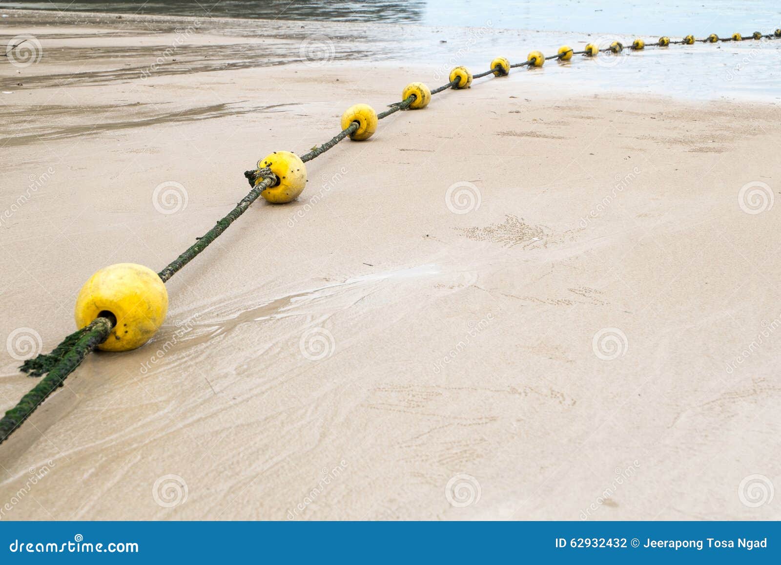 Yellow buoy and rope stock photo. Image of fisherman 62932432