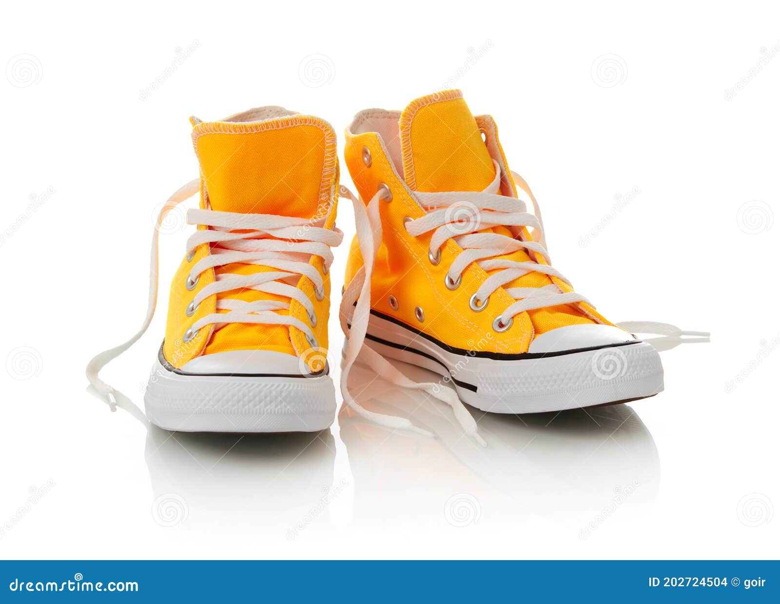 Yellow canvas shoes stock photo. Image of colors, sports 202724504