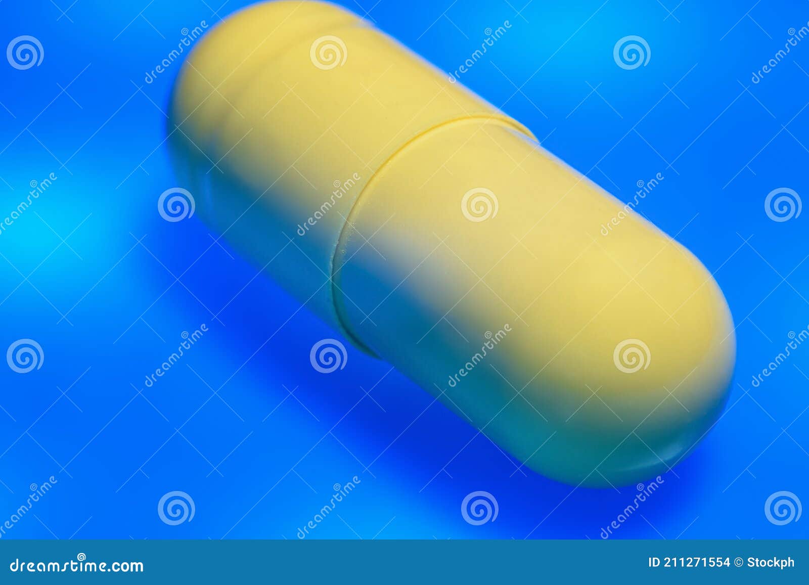 Yellow Capsule Pills Close Up. Macro Stock Photo Image of illness