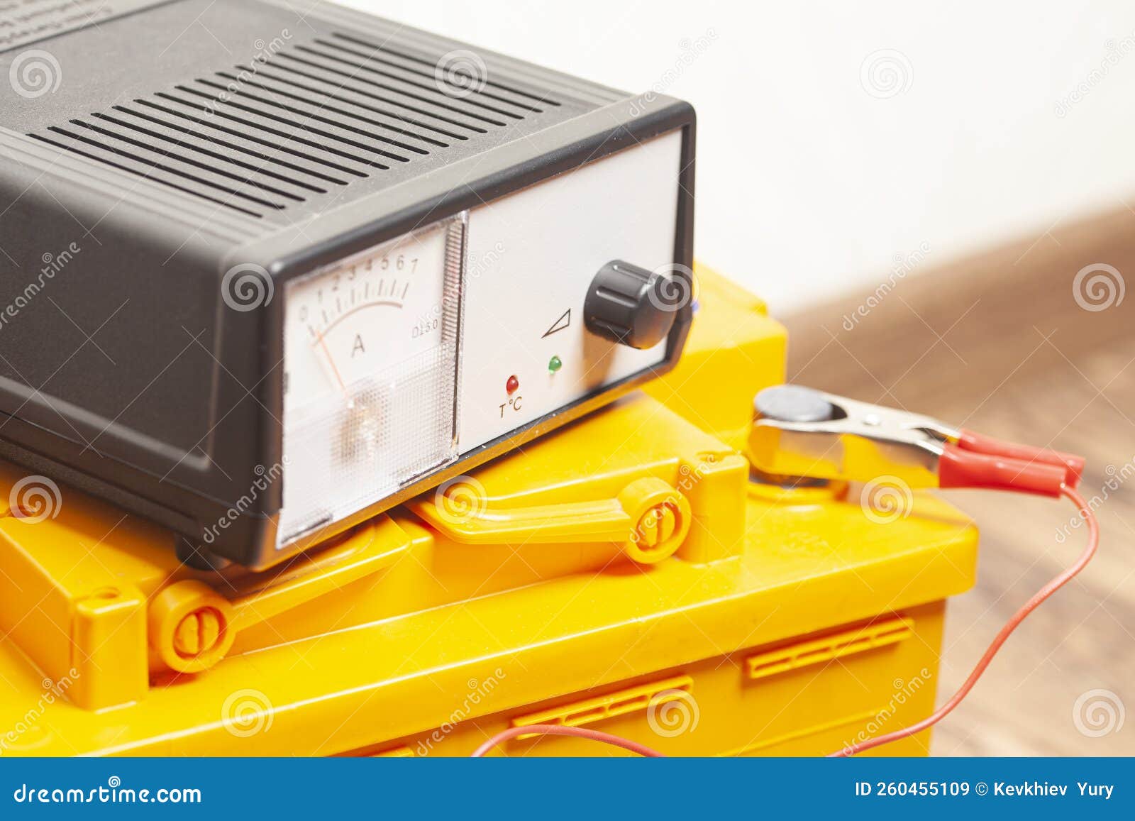 Yellow Car Battery with Car Battery Charger Stock Image Image of lead