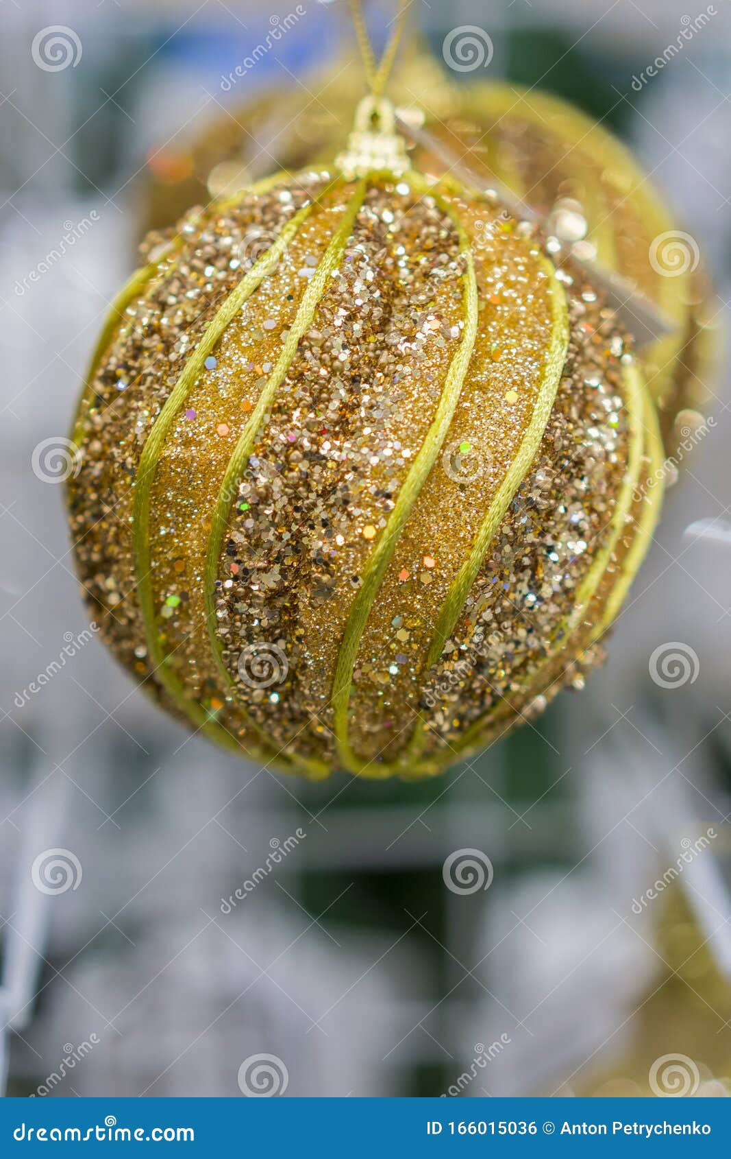 Yellow Christmas Balls in a New Year`s Store. Christmas Toys Background ...
