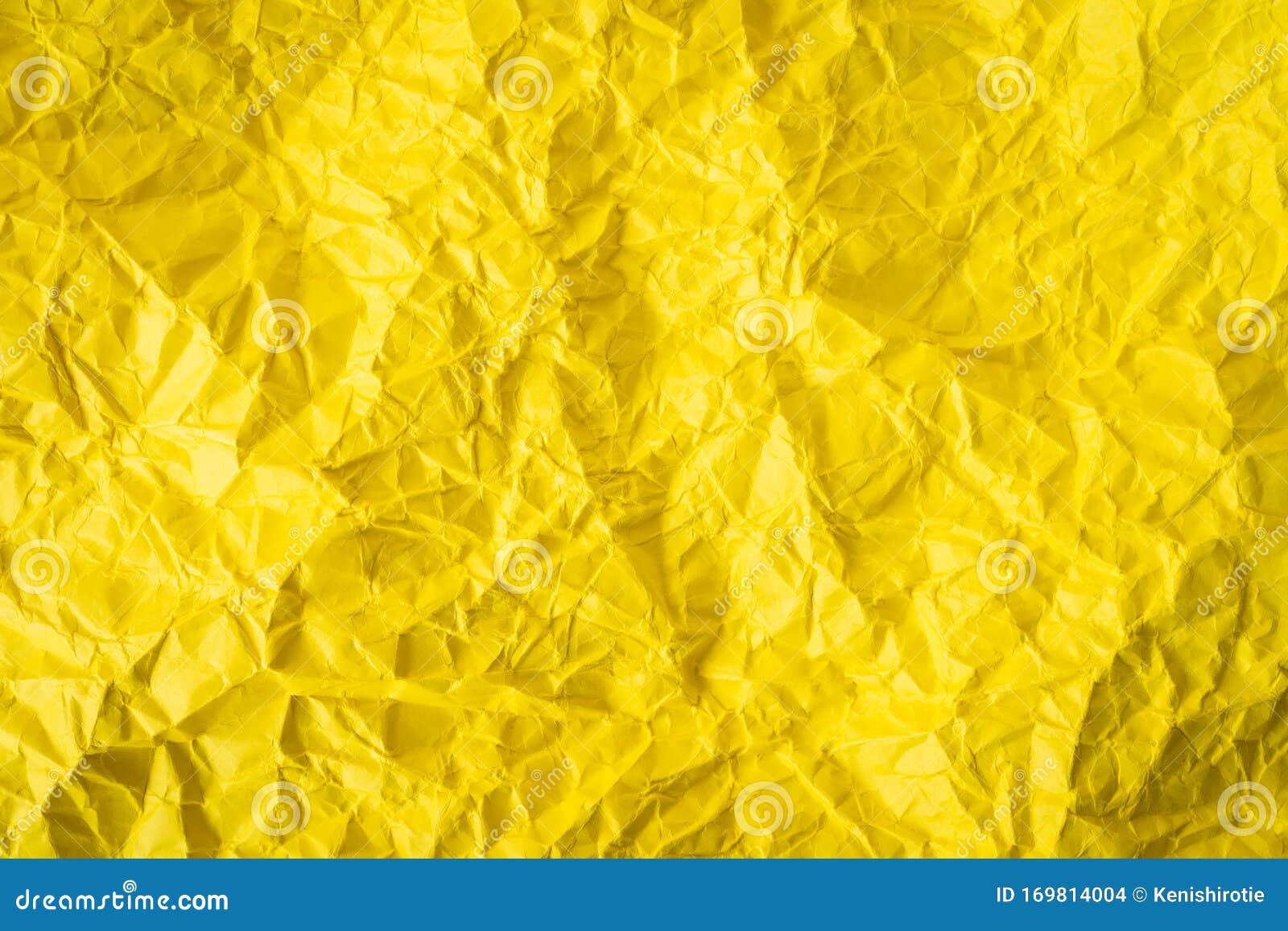 Yellow crumpled paper background texture hi-res stock photography