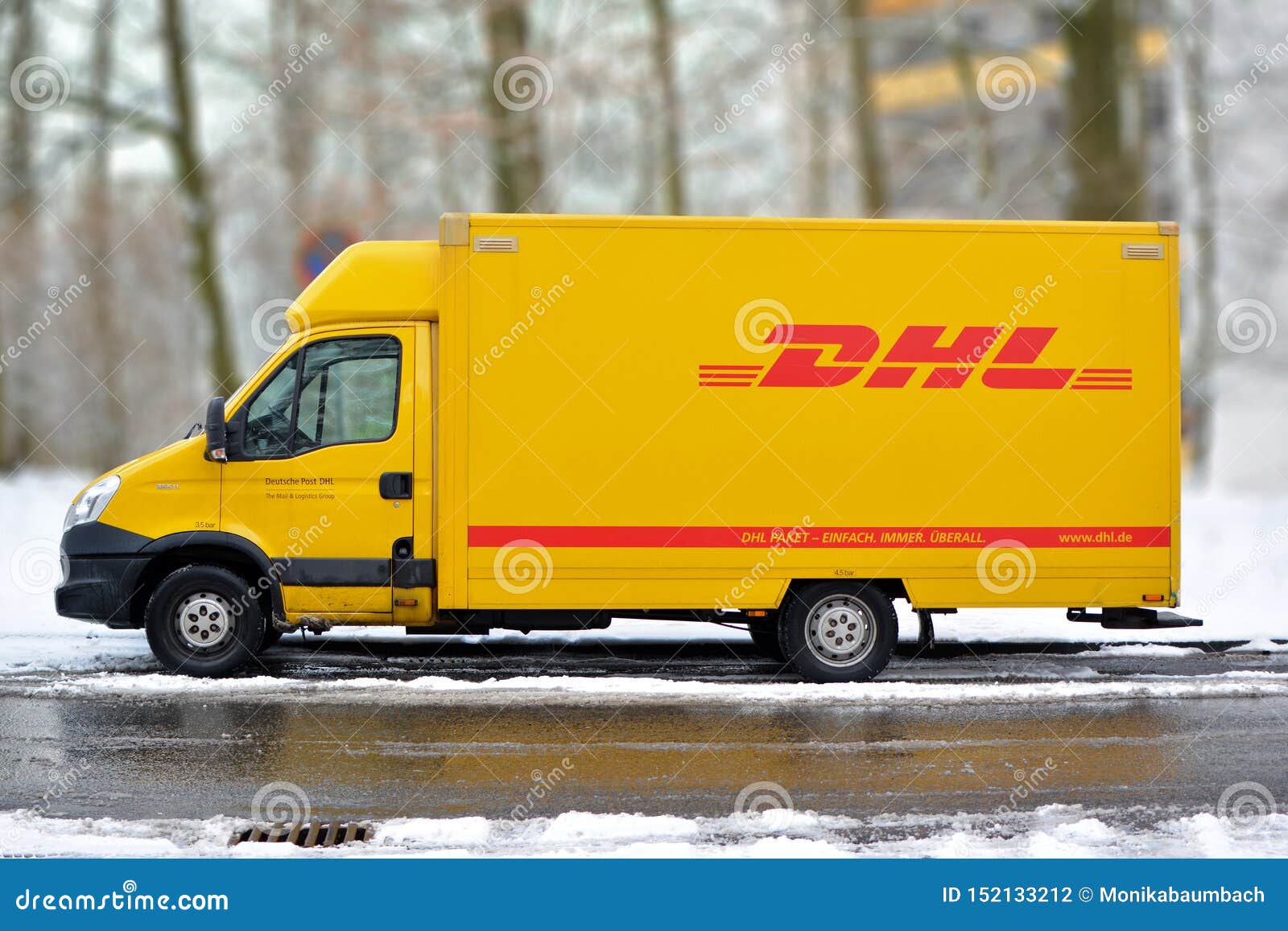 Yellow DHL International Courier and Parcel Deliivery Service Truck in Snow  Editorial Photography - Image of parcel, delivery: 152133212
