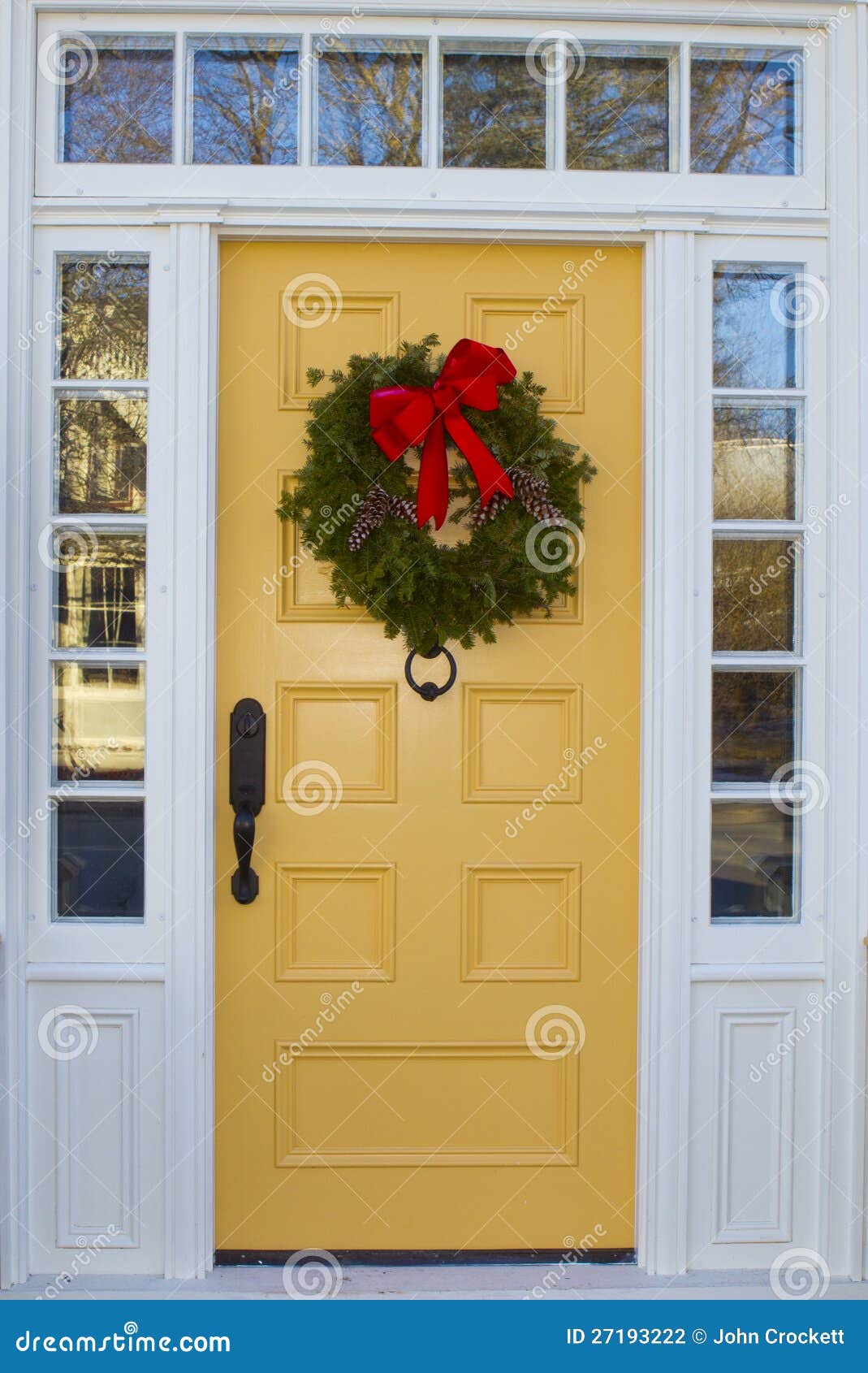 Yellow Door with Wreath stock photo. Image of ribbon 