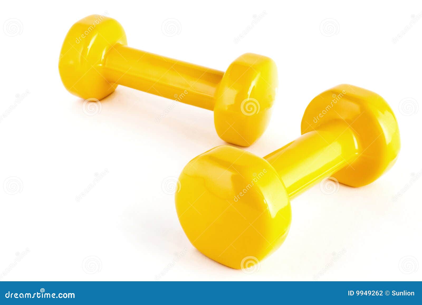 Yellow dumbbells stock photo. Image of healthy, strength 9949262
