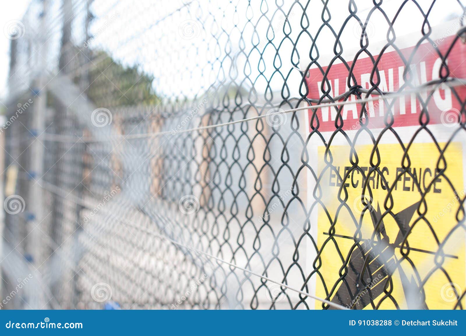 Yellow electric fence. stock photo. Image of symbol, electric 91038288