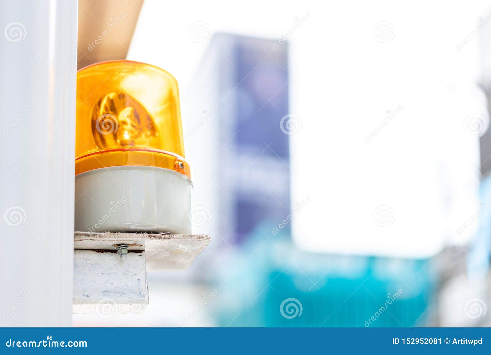 Yellow Emergency Light on the Left Side with Blur Background. Safety