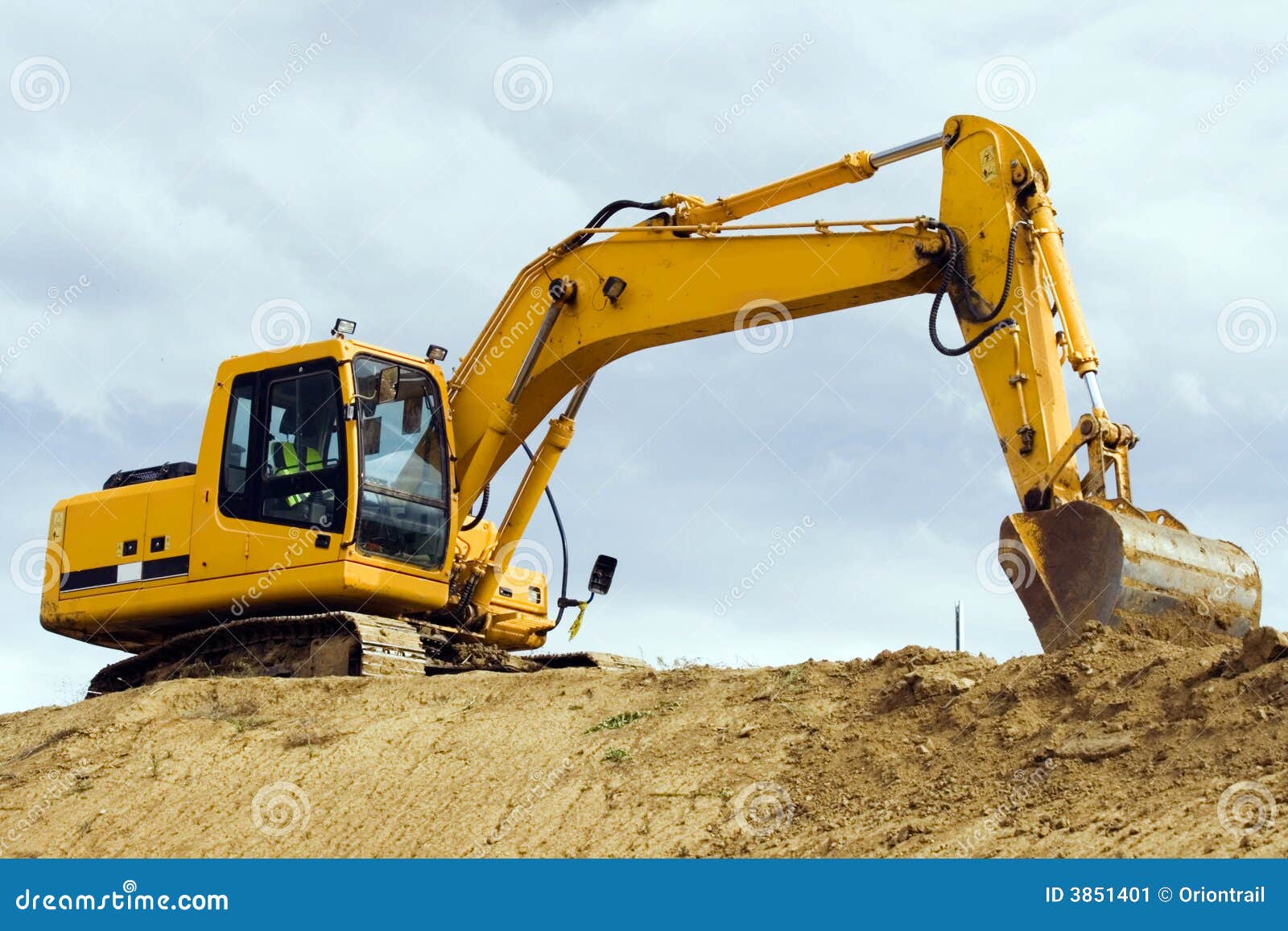 yellow excavator machine
