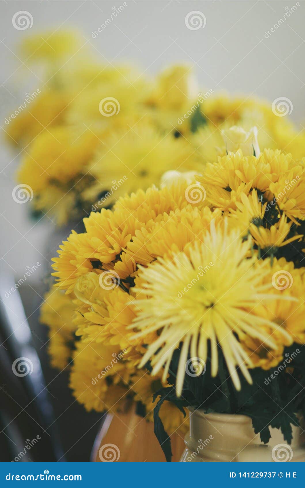Yellow flowers in vase stock image. Image of celebrate 141229737