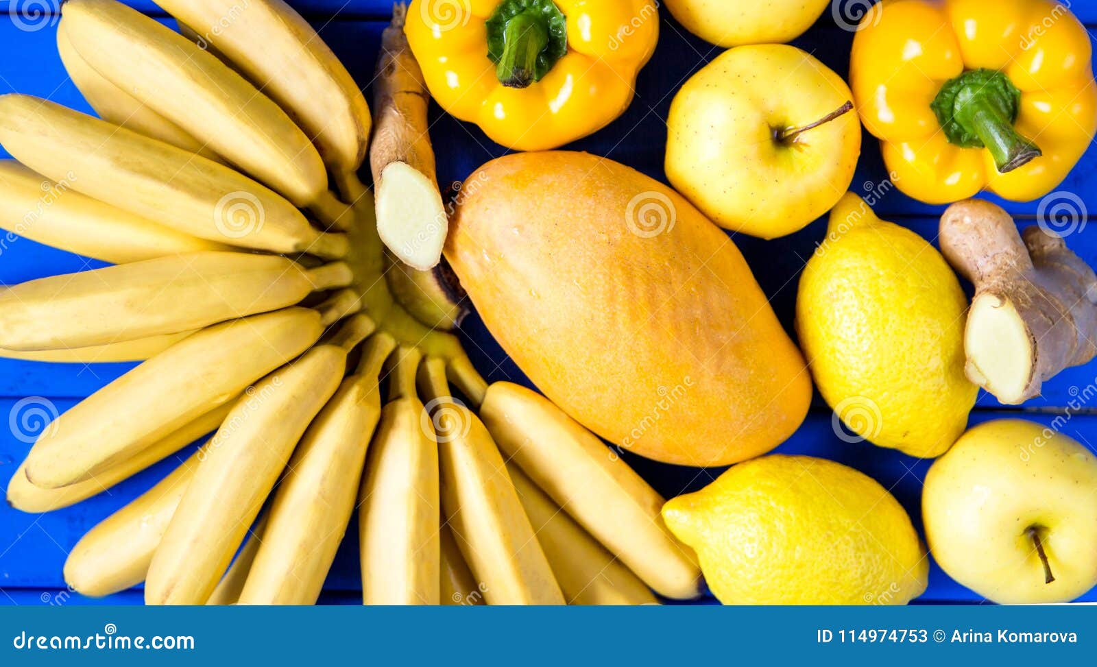 Yellow Fruits And Vegetables Isolated On A Blue Background Stock Image ...