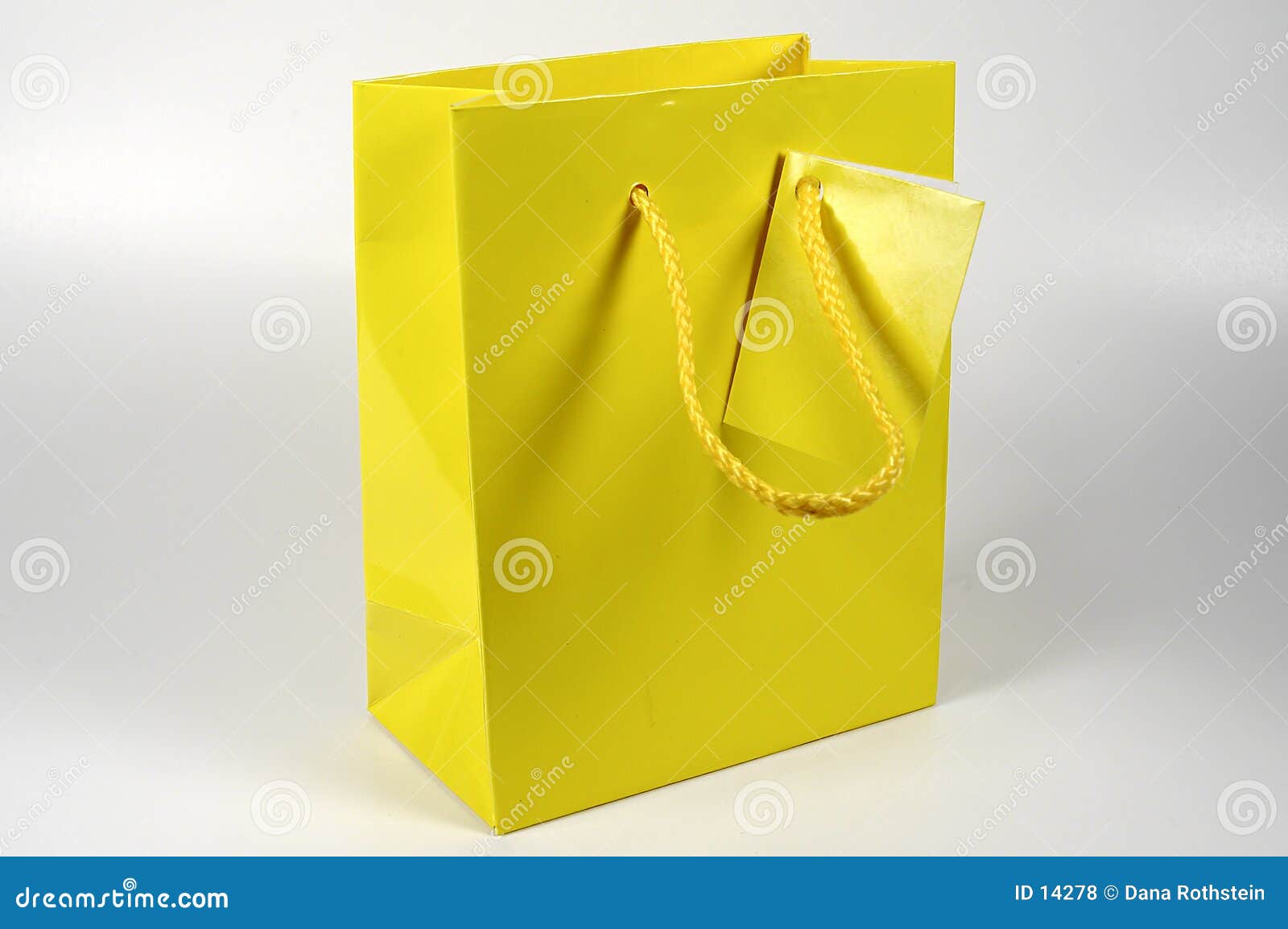 yellow and gray gift bags