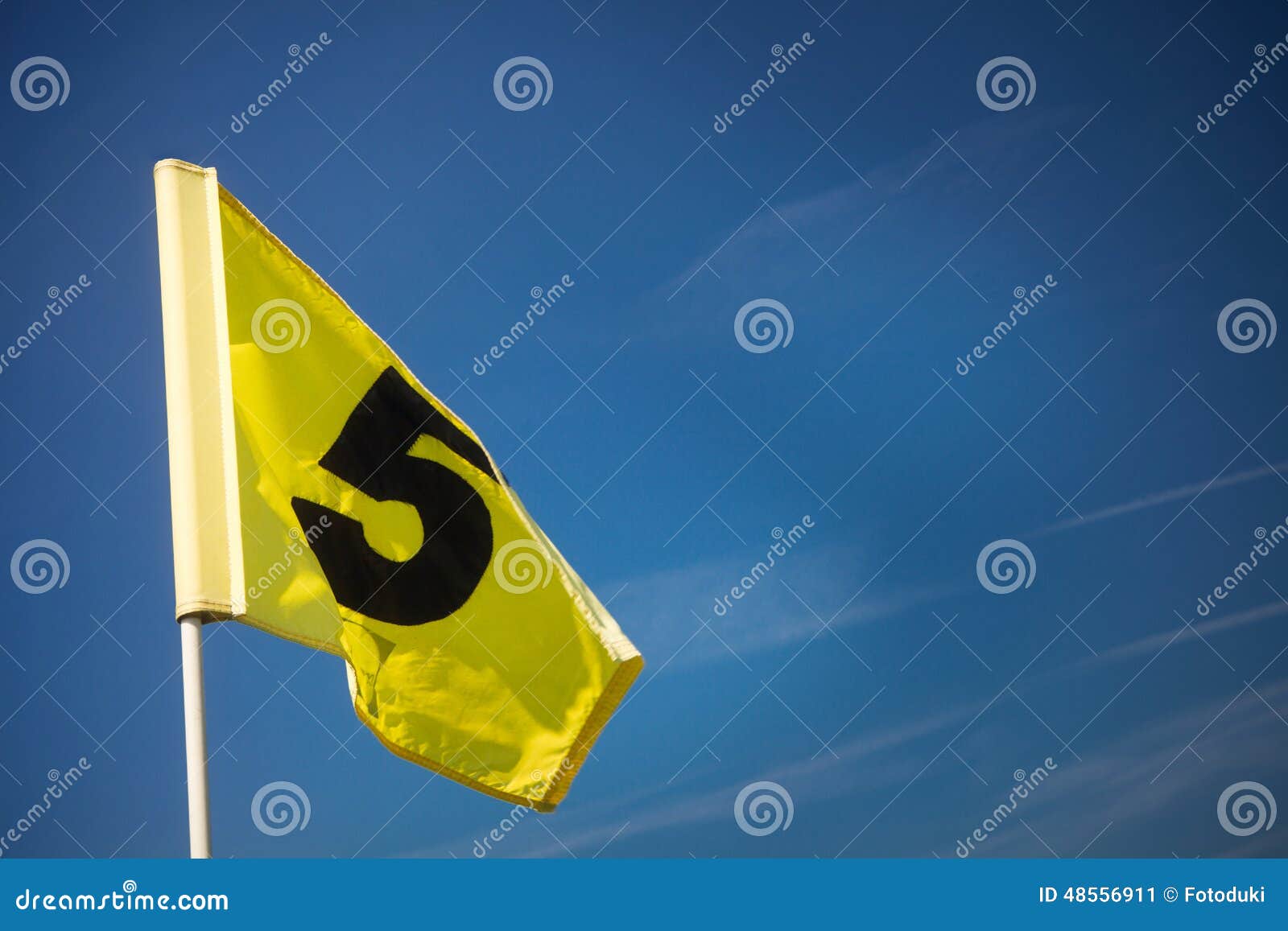 Yellow golf flag stock image. Image of blue, club, resort 48556911