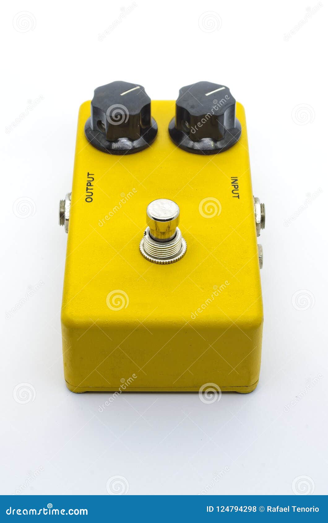 Yellow guitar effect pedal stock photo. Image of cable 124794298