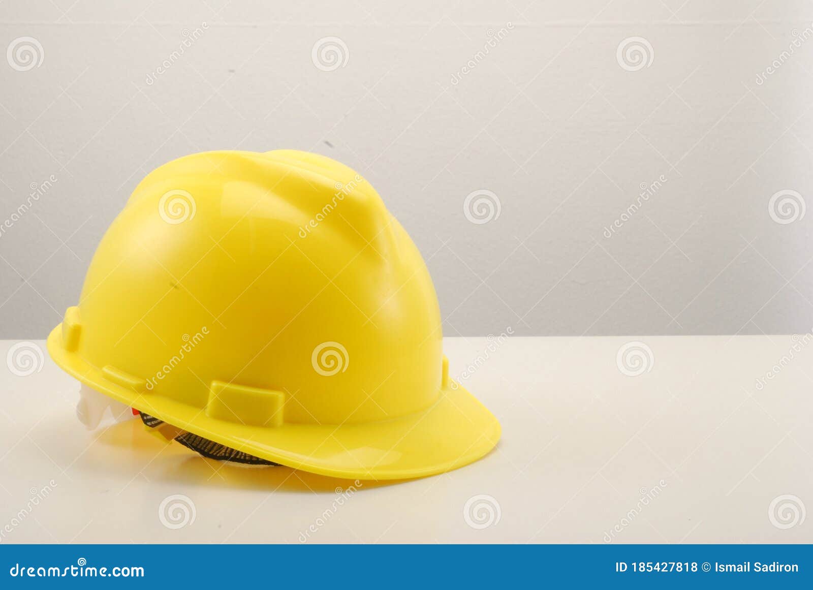 Yellow Hard Hat on White Table Stock Photo Image of business