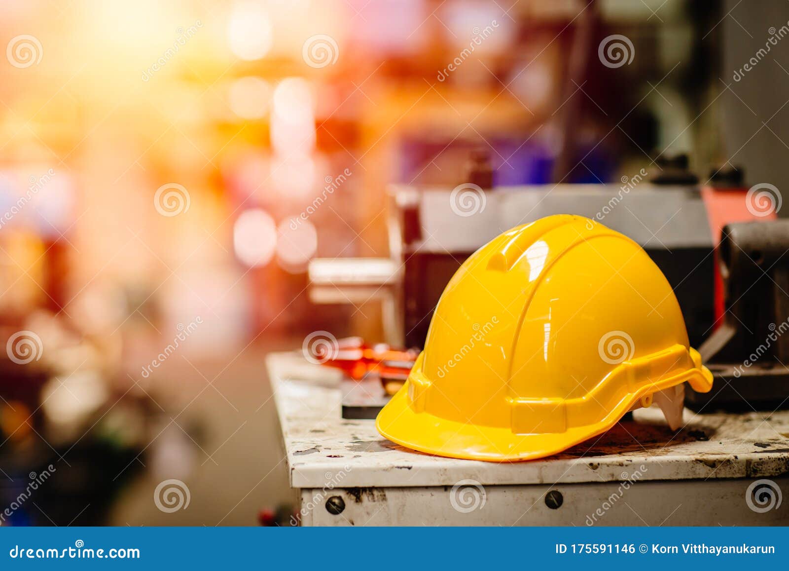 yellow helmet hardhat safety for factory worker working in danger workplace with space for text