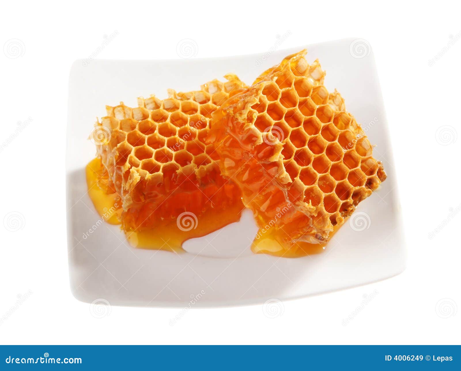 Yellow Natural Bee Wax With A Piece Of Honey Cell On A White