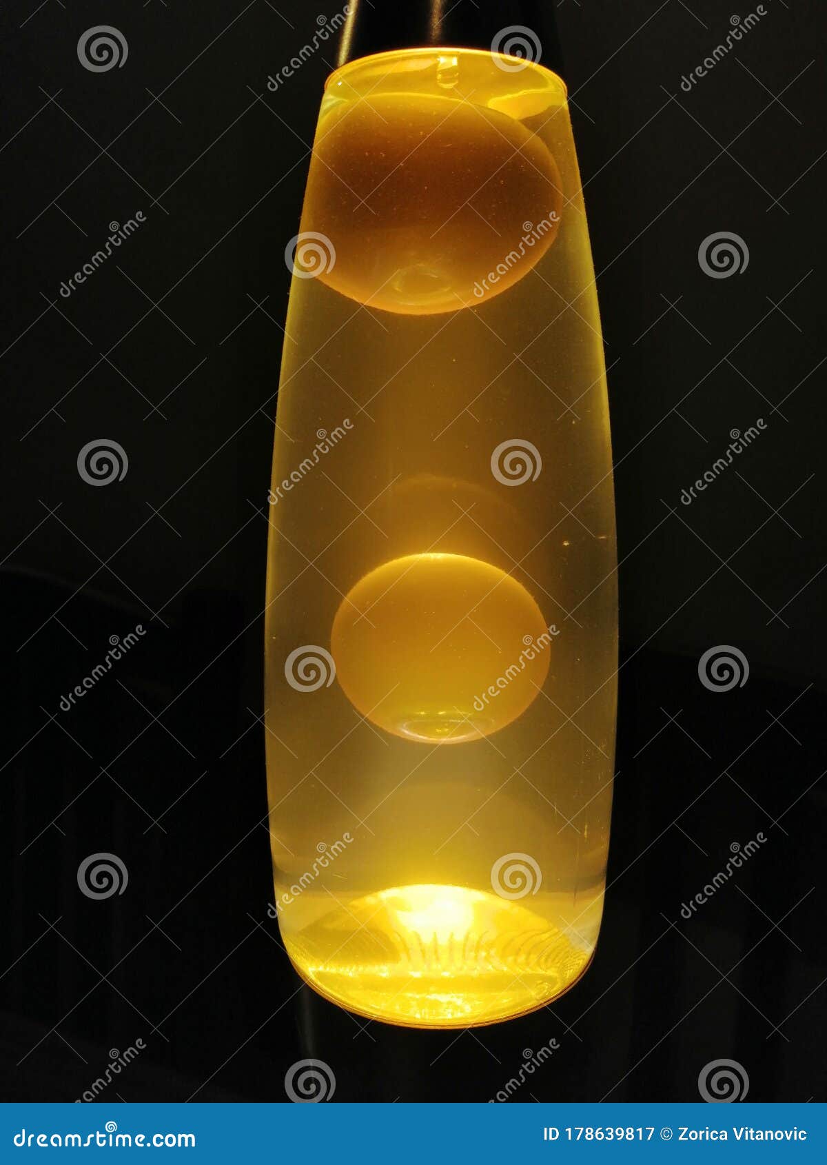 Yellow lava lamp closeup stock image. Image of flame 178639817