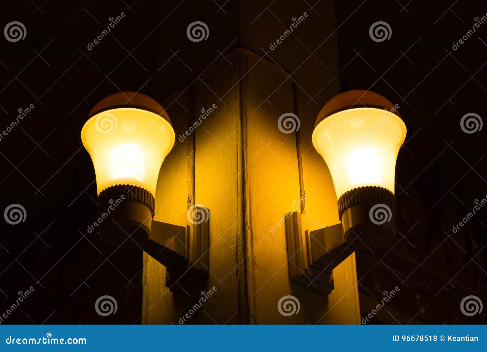 Yellow Light Bulb with Pole in Dark Room. Stock Photo Image of pole