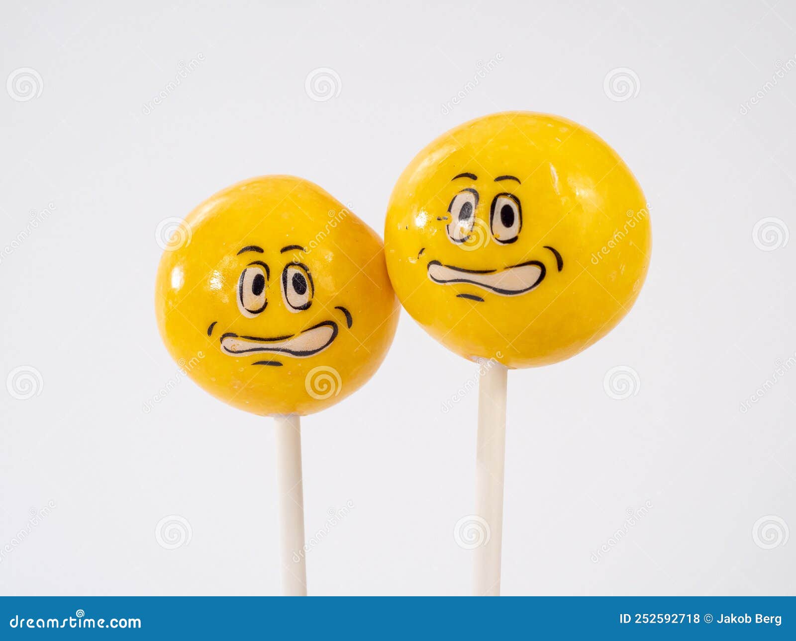 Yellow Lollipops. Lollipops with a Painted Face Stock Photo - Image of