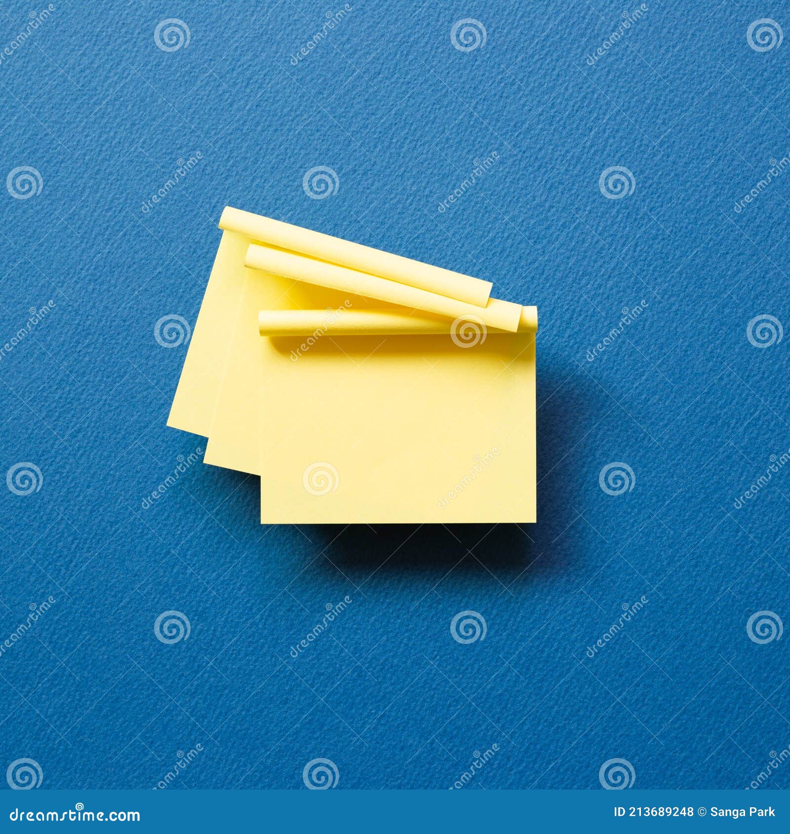 Yellow Memo Pad Sticky Note on Blue Background Stock Photo Image of