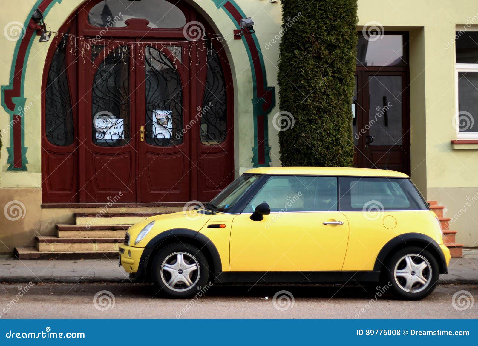Yellow mini cooper editorial stock photo. Image of street 89776008