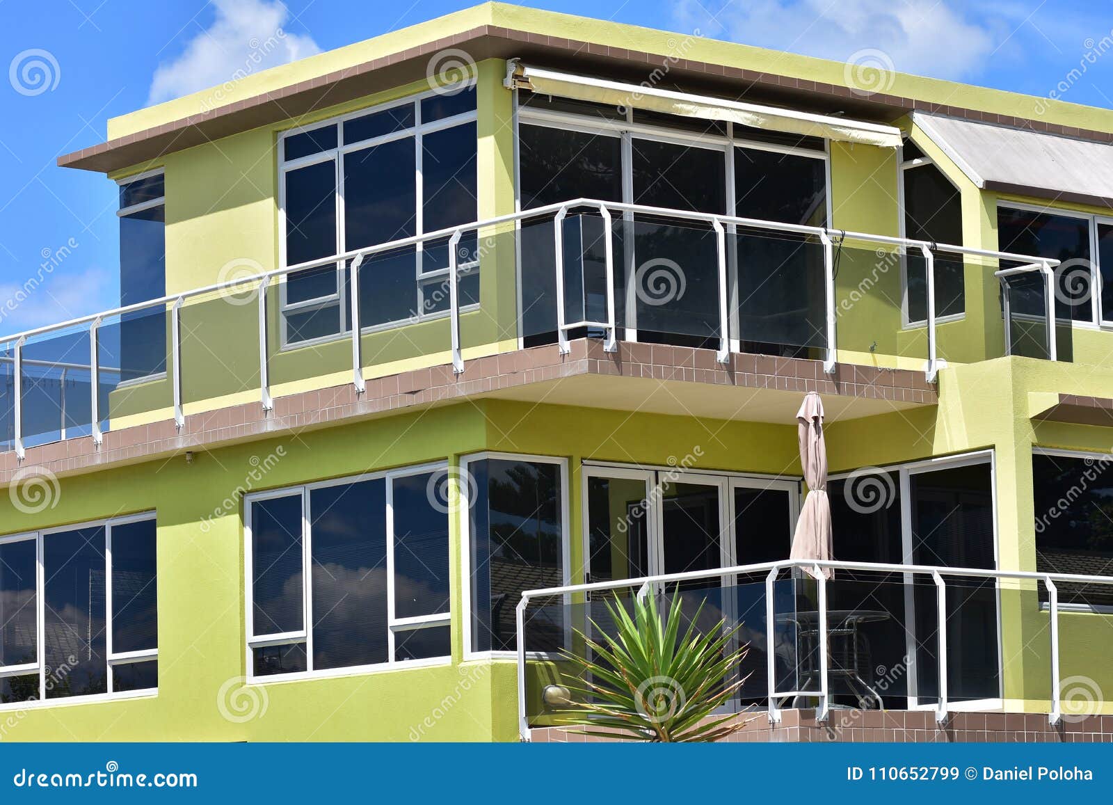 yellow multi-story holiday house