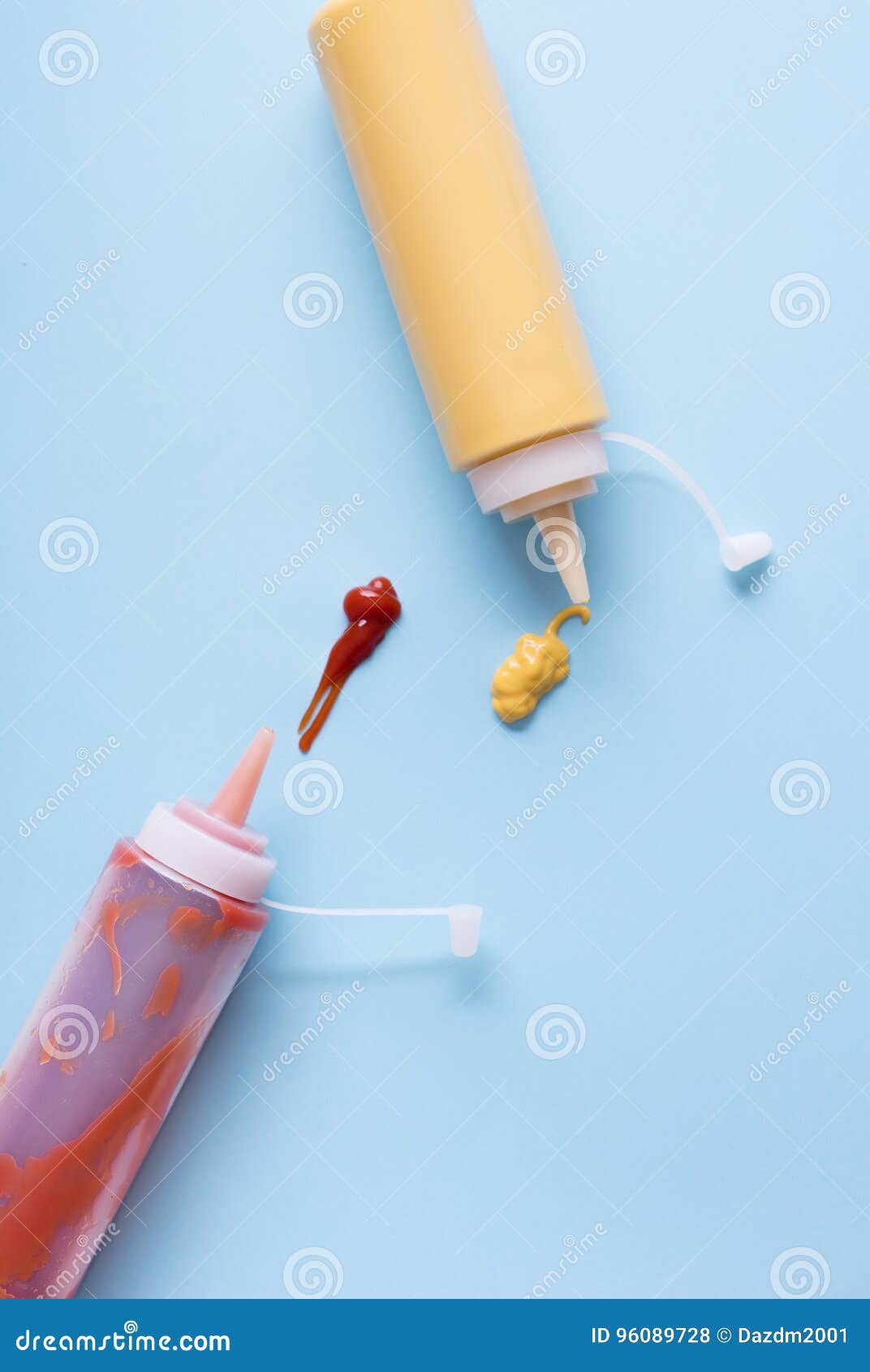 Yellow Mustard and Tomato Ketchup in Plastic Bottles. Stock Photo