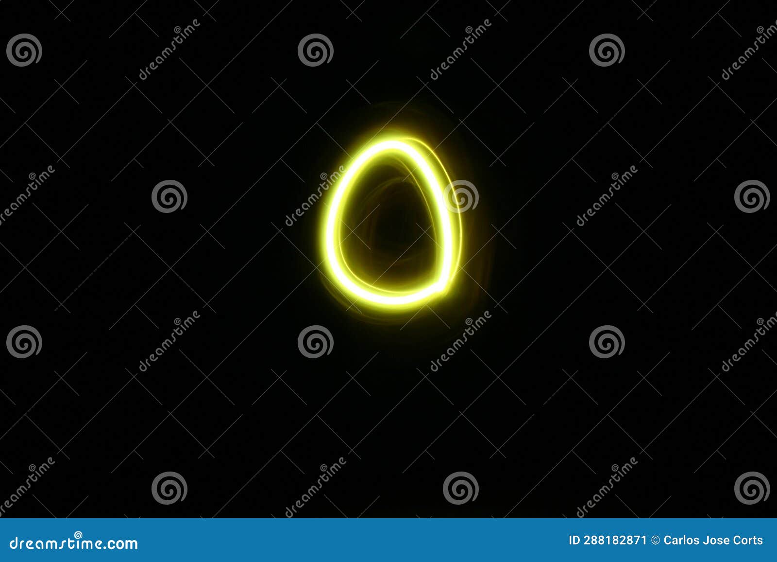 circle-oval d yellow neon light suspended in black space