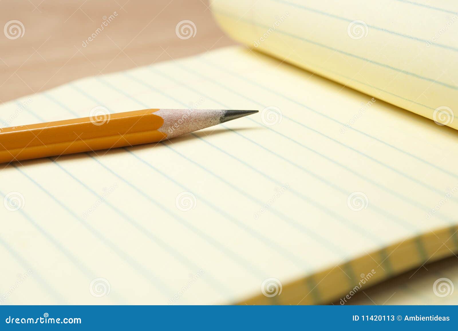 Yellow Notepad With Pencil Stock Photos - Image: 11420113