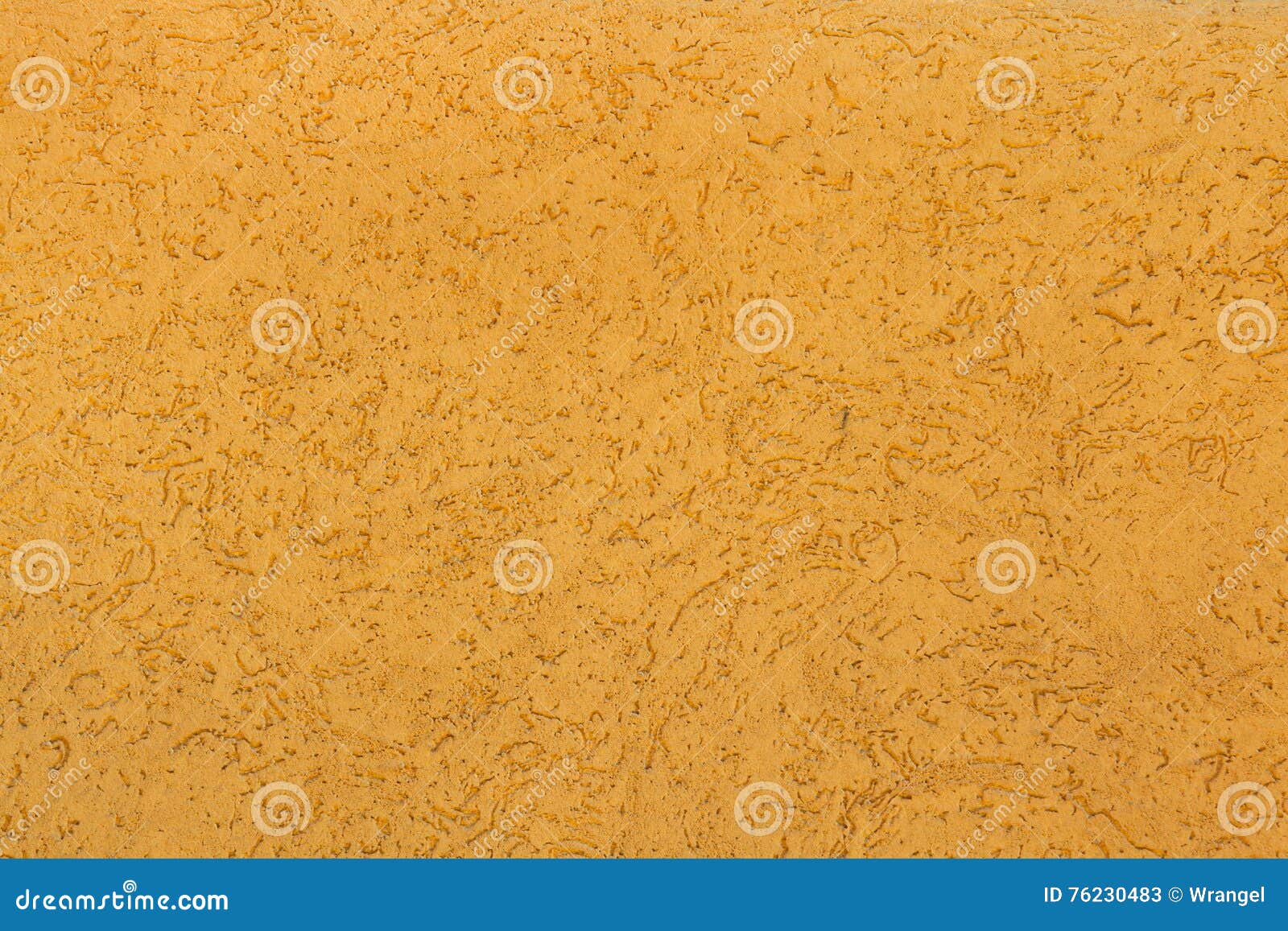 yellow ochre painted stucco wall. background texture