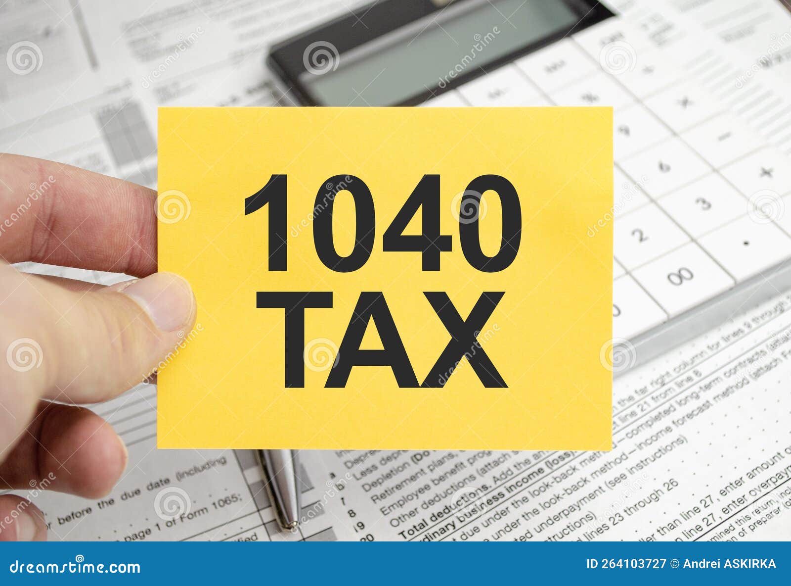 Yellow Paper with the Words 1040 Tax and Tax Forms with Calculator