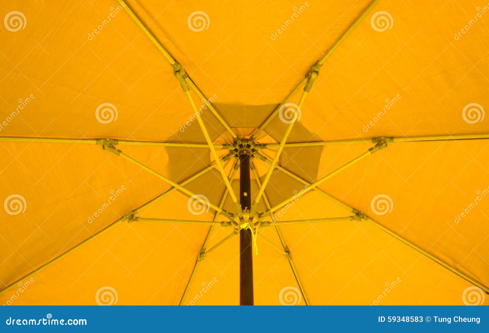 Yellow Patio umbrella stock image. Image of summer, hotel 59348583