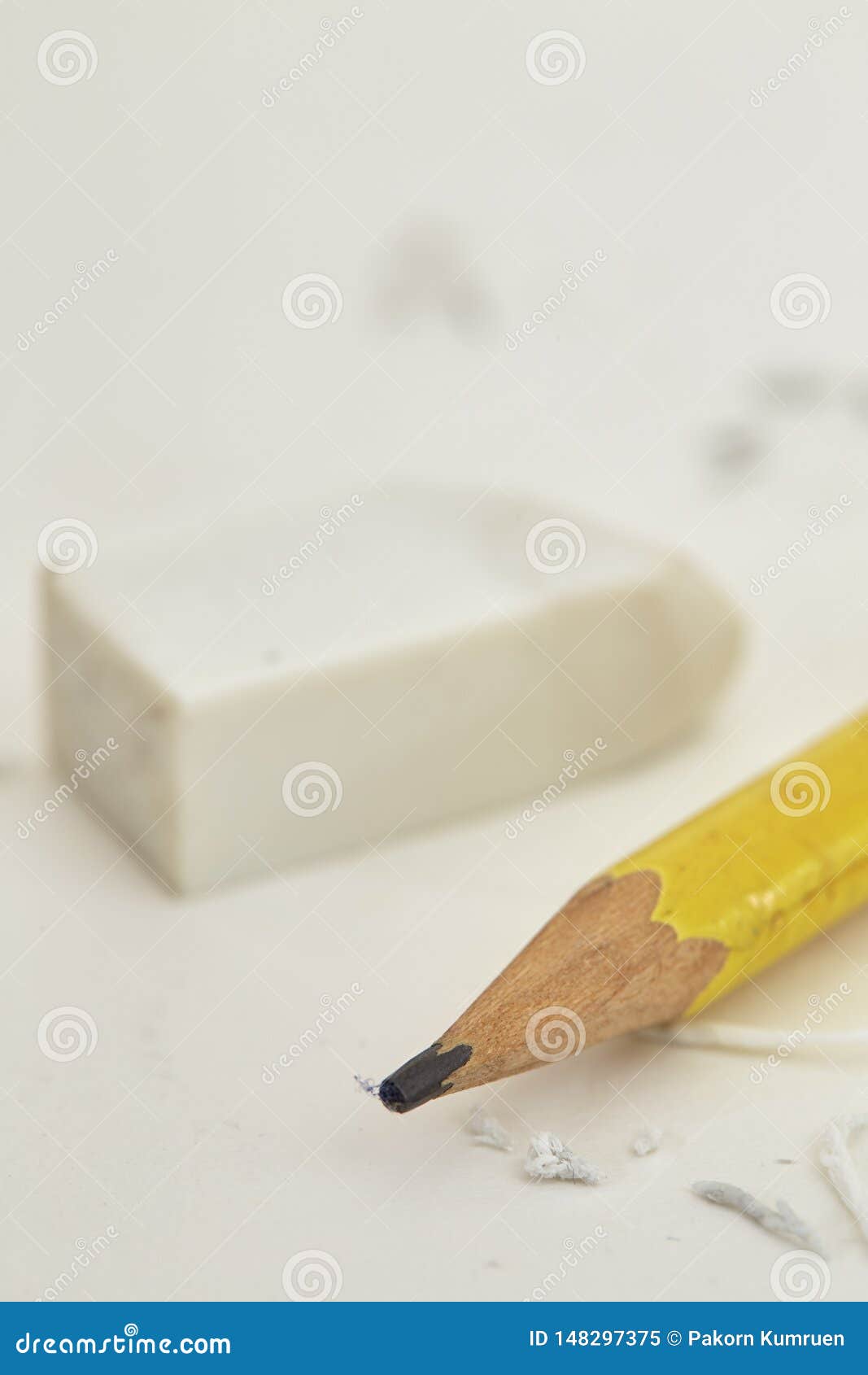 Yellow Pencil White Eraser And Eraser Leftovers White Background Stock