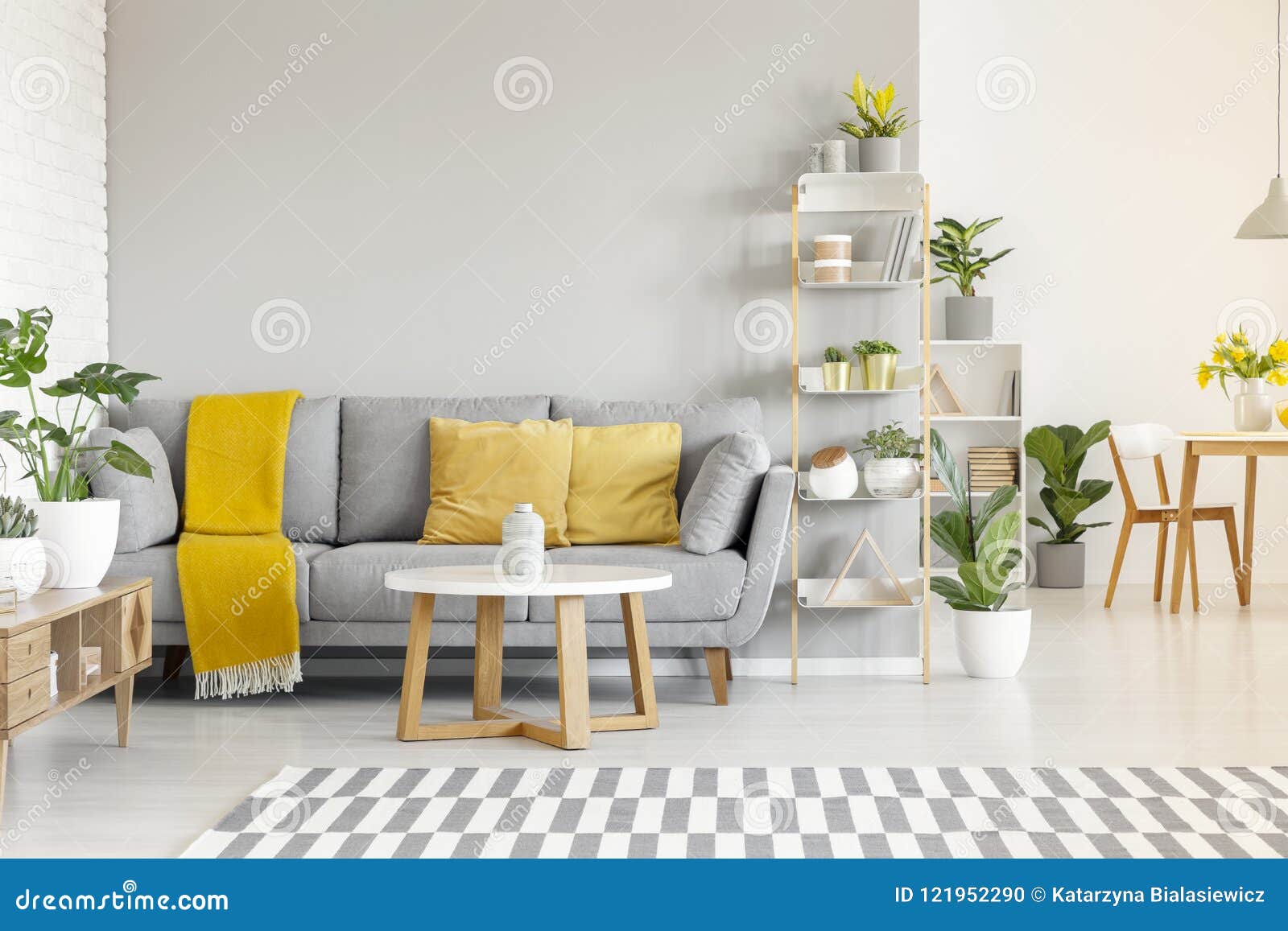 Yellow Pillows And Blanket On Grey Sofa In Modern Living