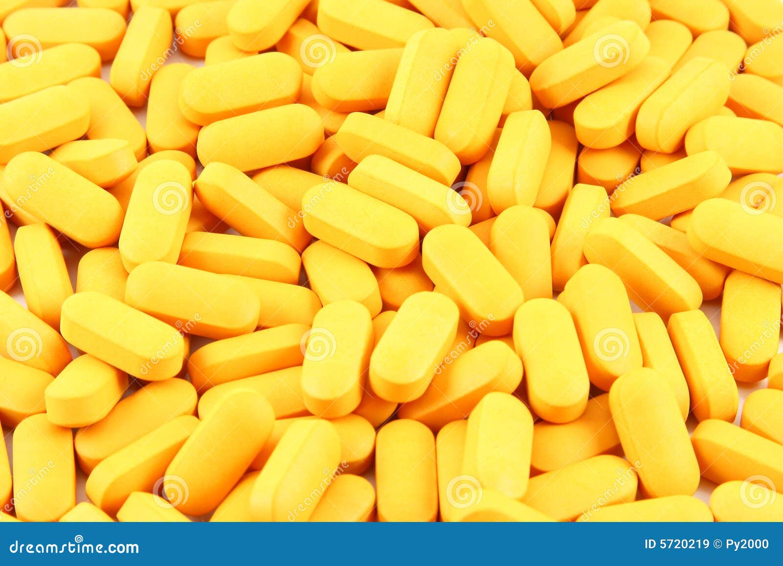 Yellow Pills Background stock image. Image of encased 5720219