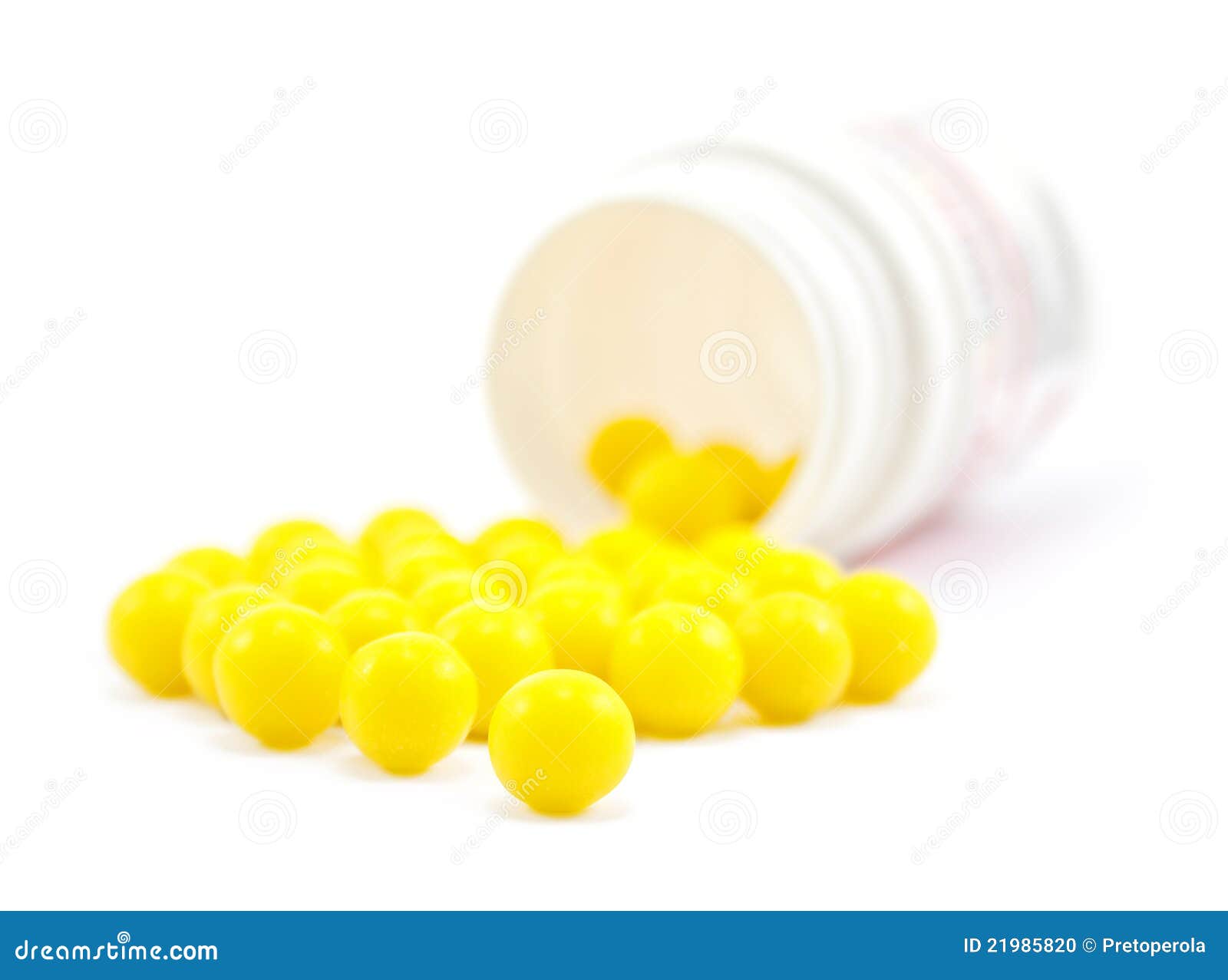 Yellow pills from bottle stock photo. Image of industry 21985820