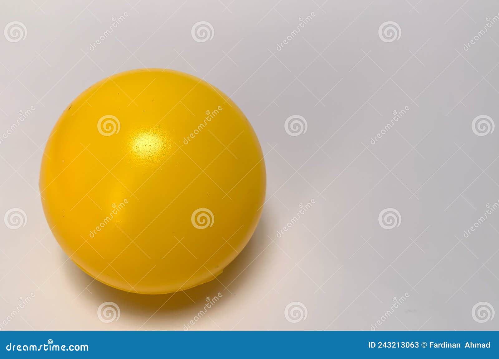 Yellow plastic ball stock image. Image of game, green 243213063