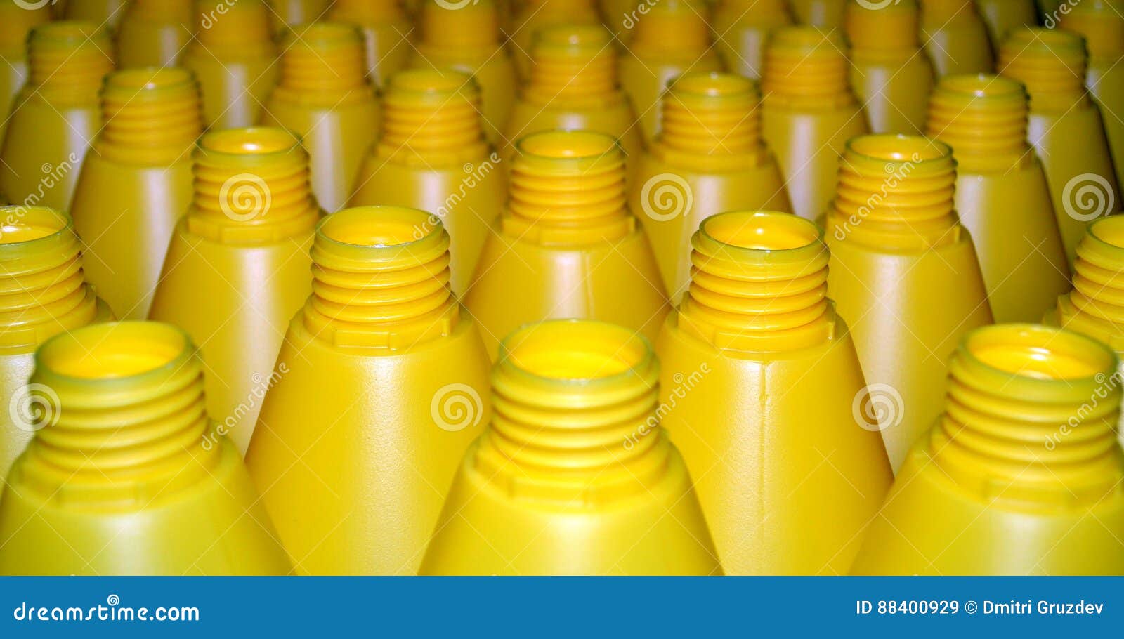 Yellow plastic bottles stock image. Image of care, package 88400929