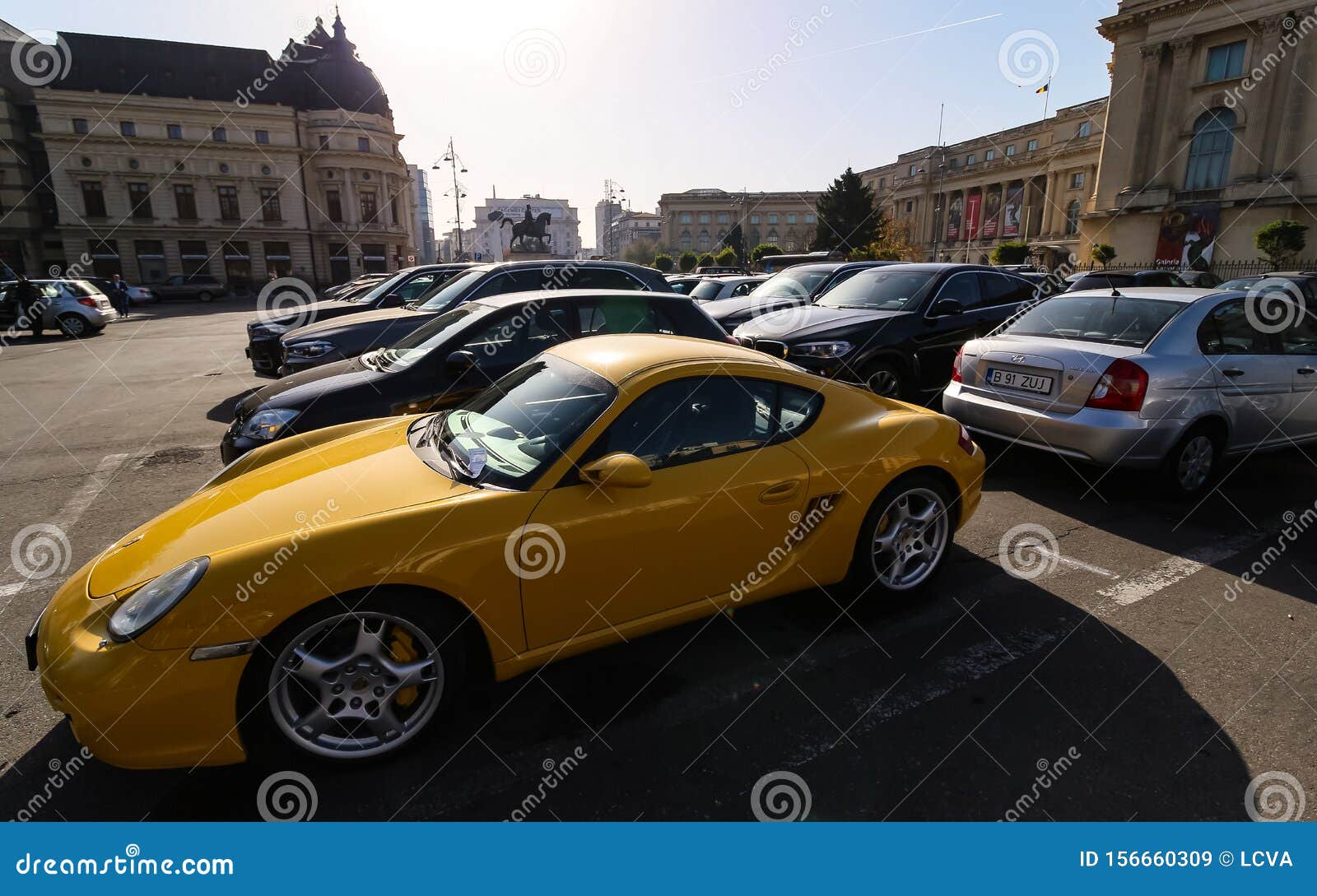 https://thumbs.dreamstime.com/z/yellow-porsche-cayman-s-bucharest-romania-october-car-seen-parking-lot-downtown-image-editorial-use-156660309.jpg