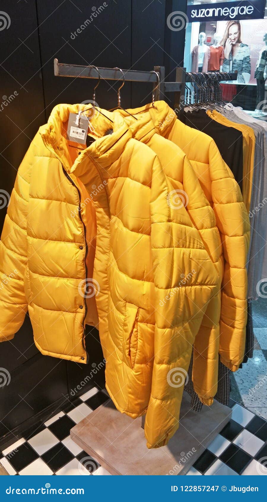 Yellow Puffer Jackets editorial photography. Image of bright - 122857247