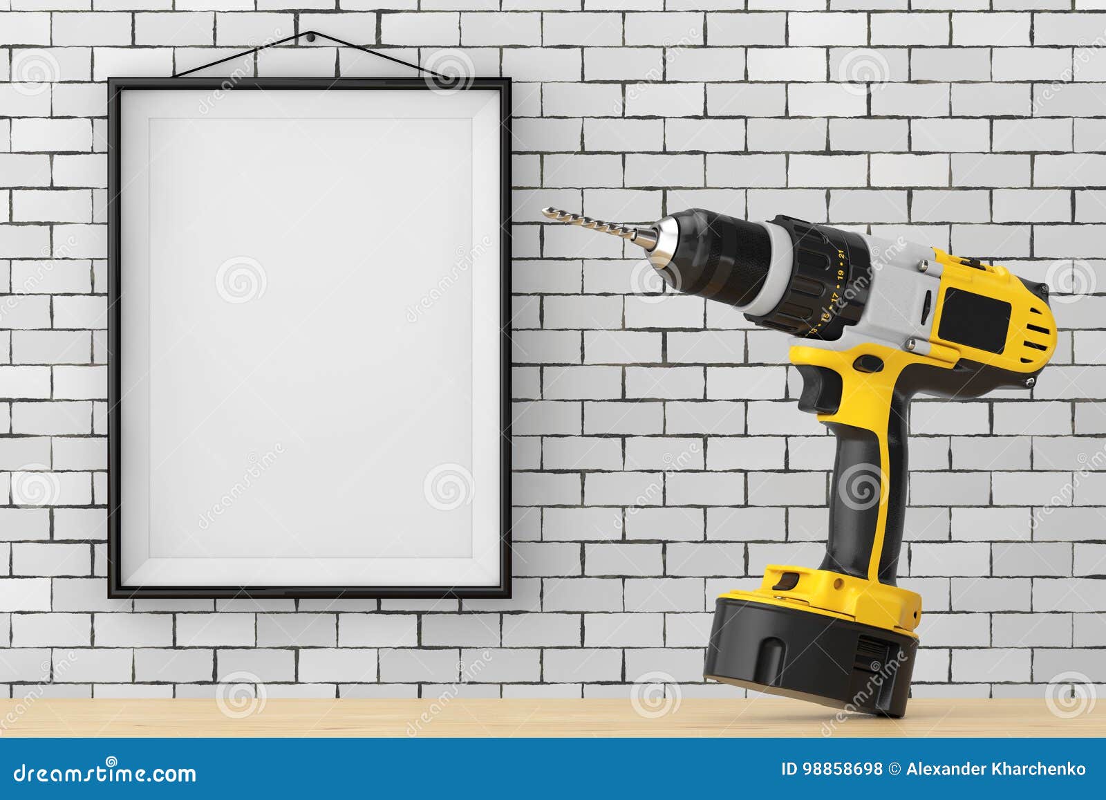 Yellow Rechargeable and Cordless Drill in Front of Brick Wall Wi Stock