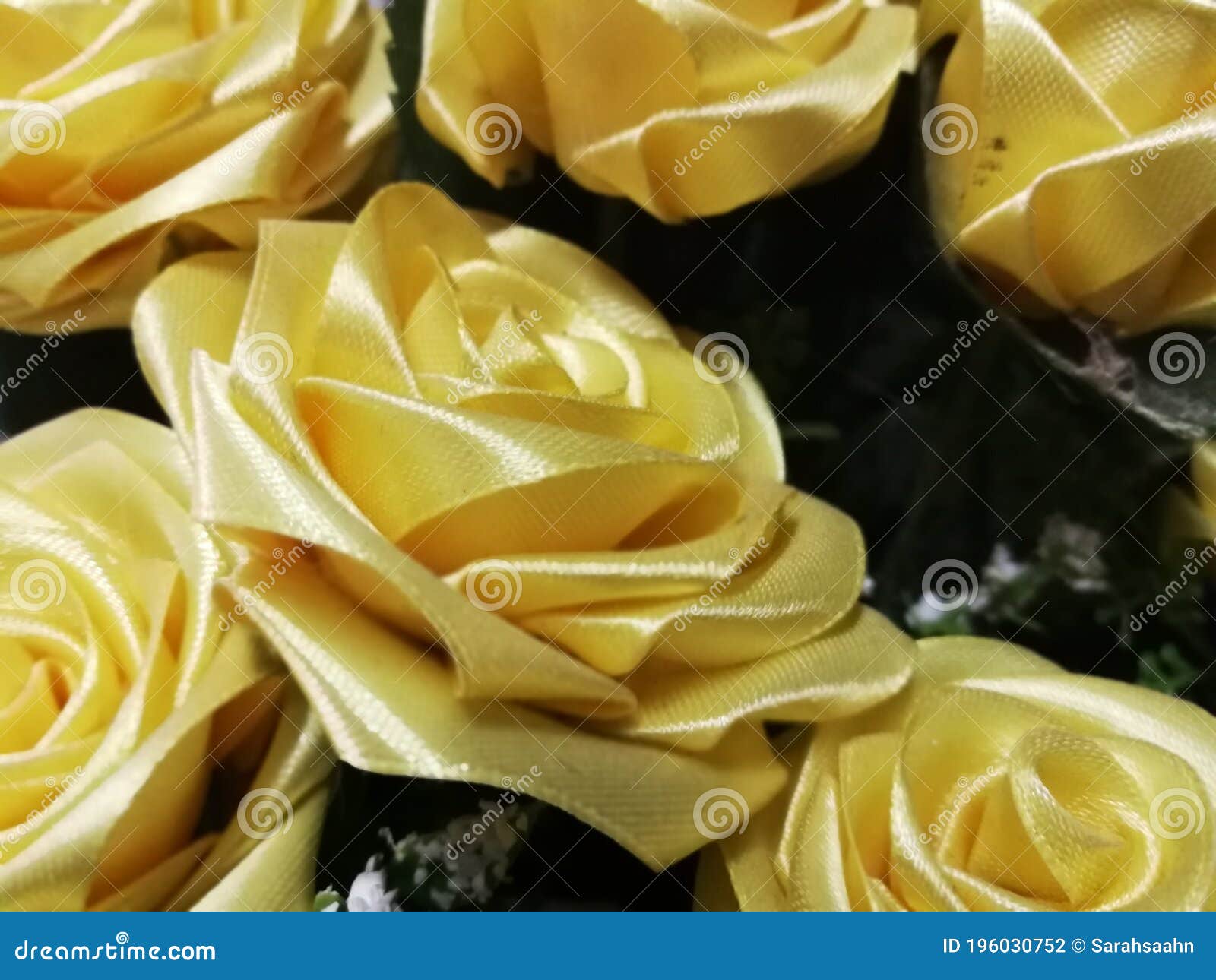 Yellow Ribbon Roses. Yellow Ribbons Folding into Roses. Stock