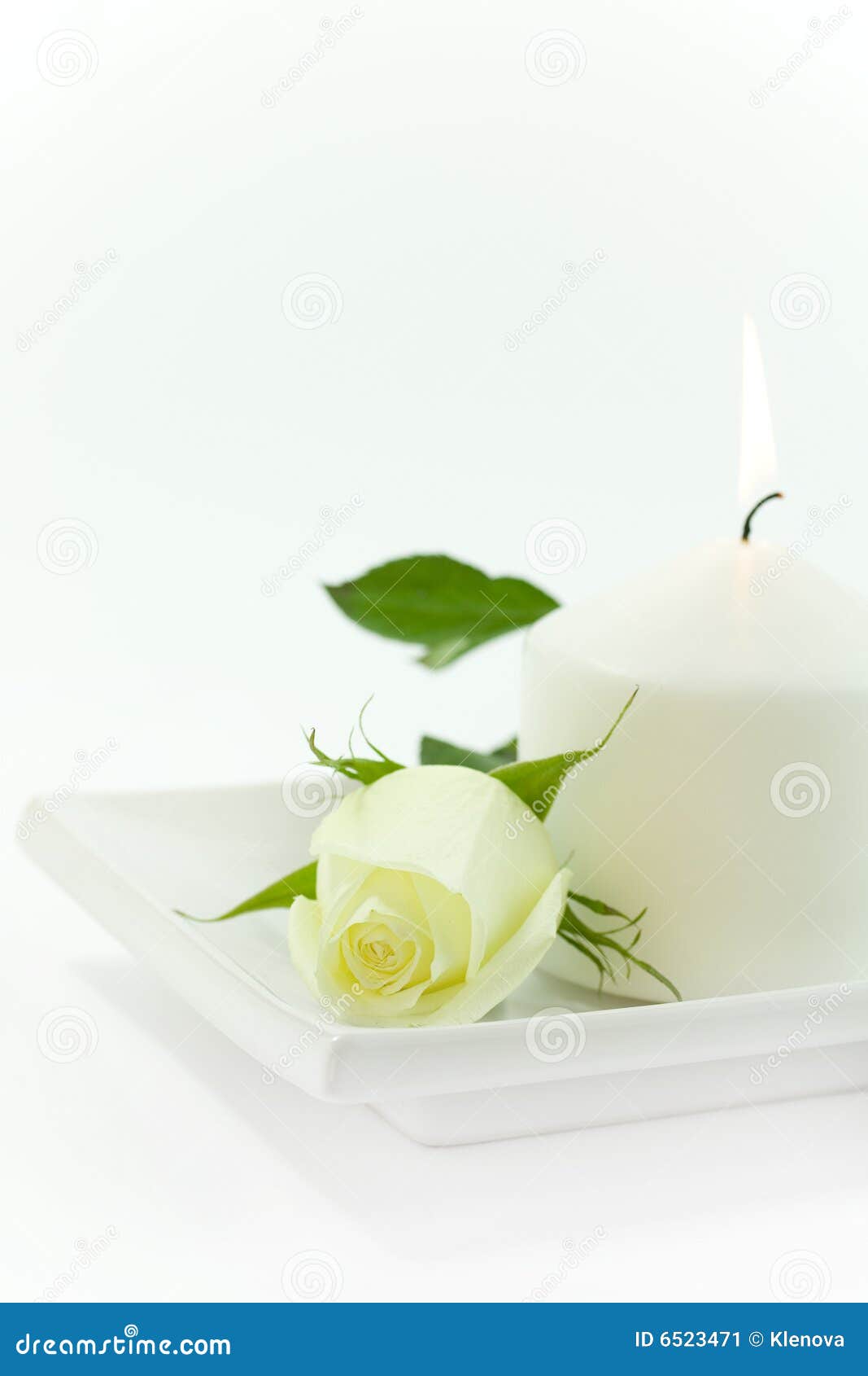 Yellow rose and candle stock image. Image of symbol, single 6523471