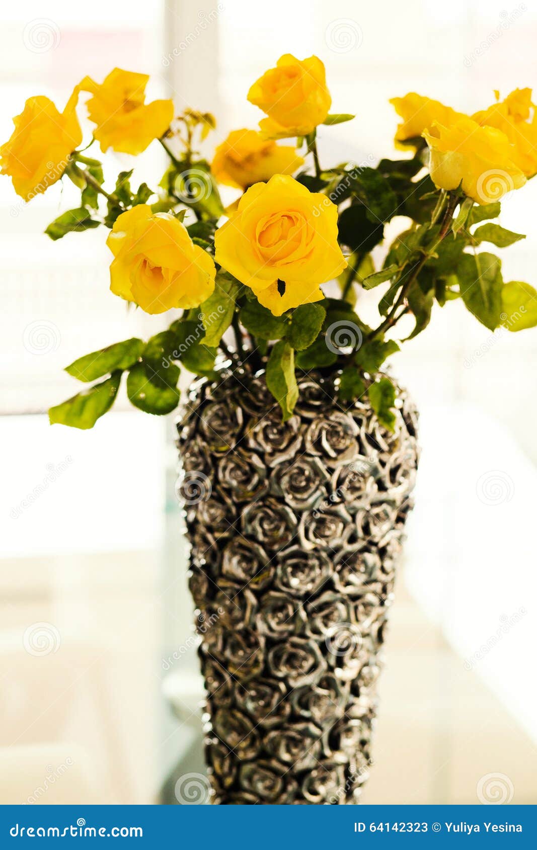 Yellow roses in a vase stock image. Image of metal, bouquet 64142323