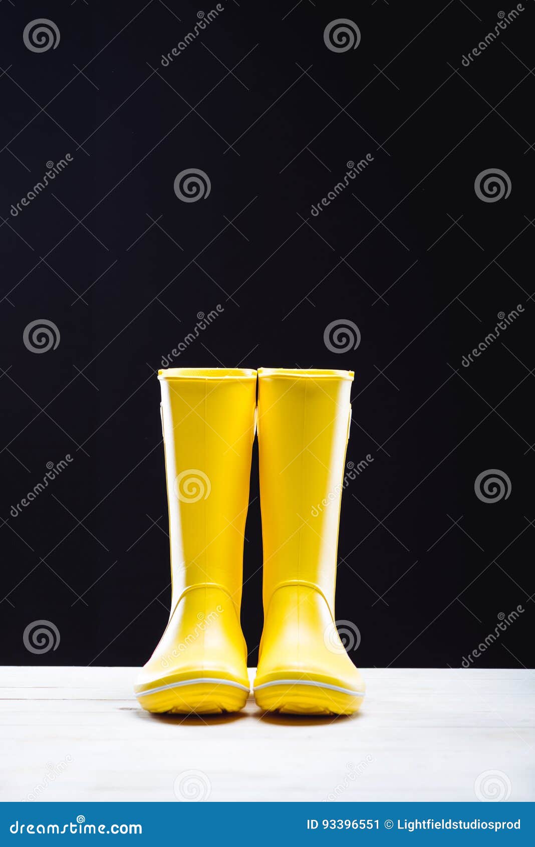 Yellow rubber boots stock image. Image of wooden, footwear 93396551