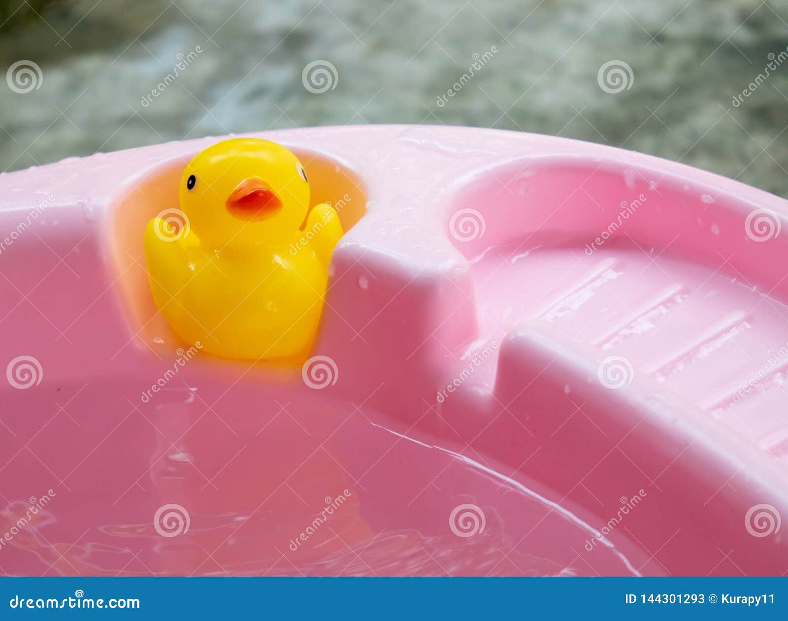 Rubber duck in the bathtub stock image. Image of view 144301293