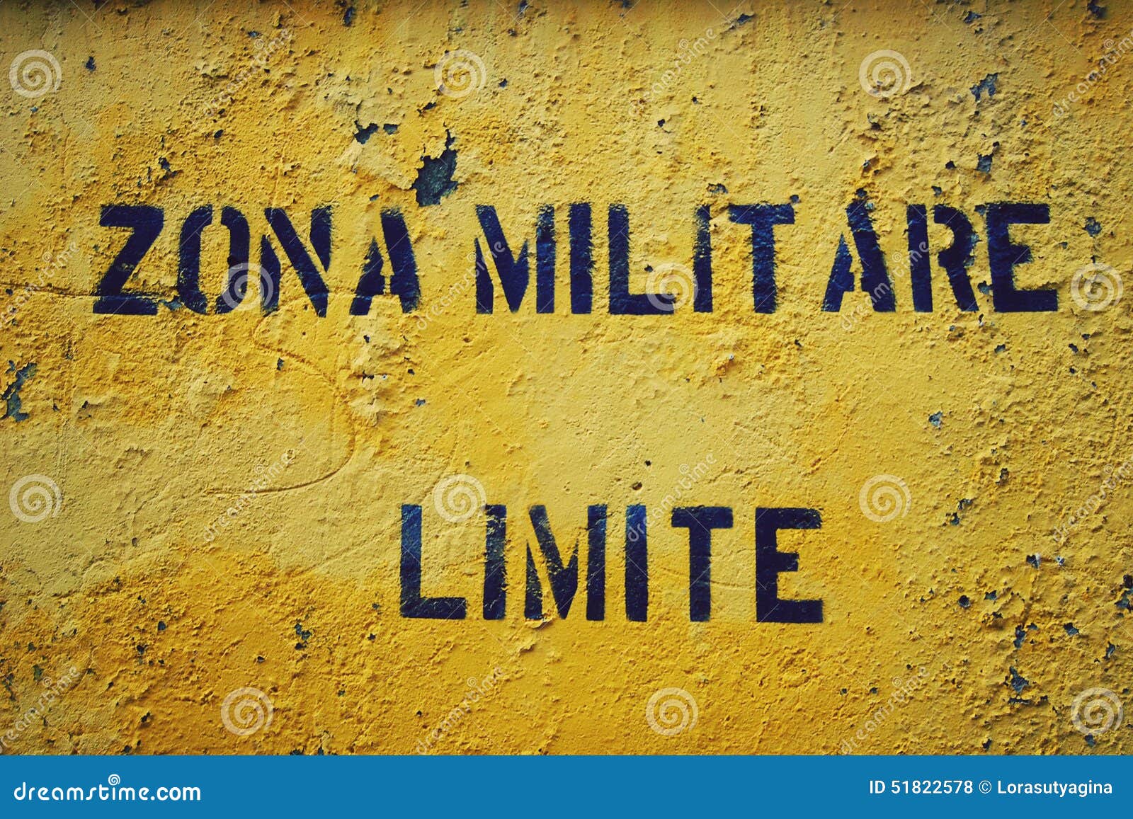 yellow sign 'zona militare limite' in italian city gaeta.