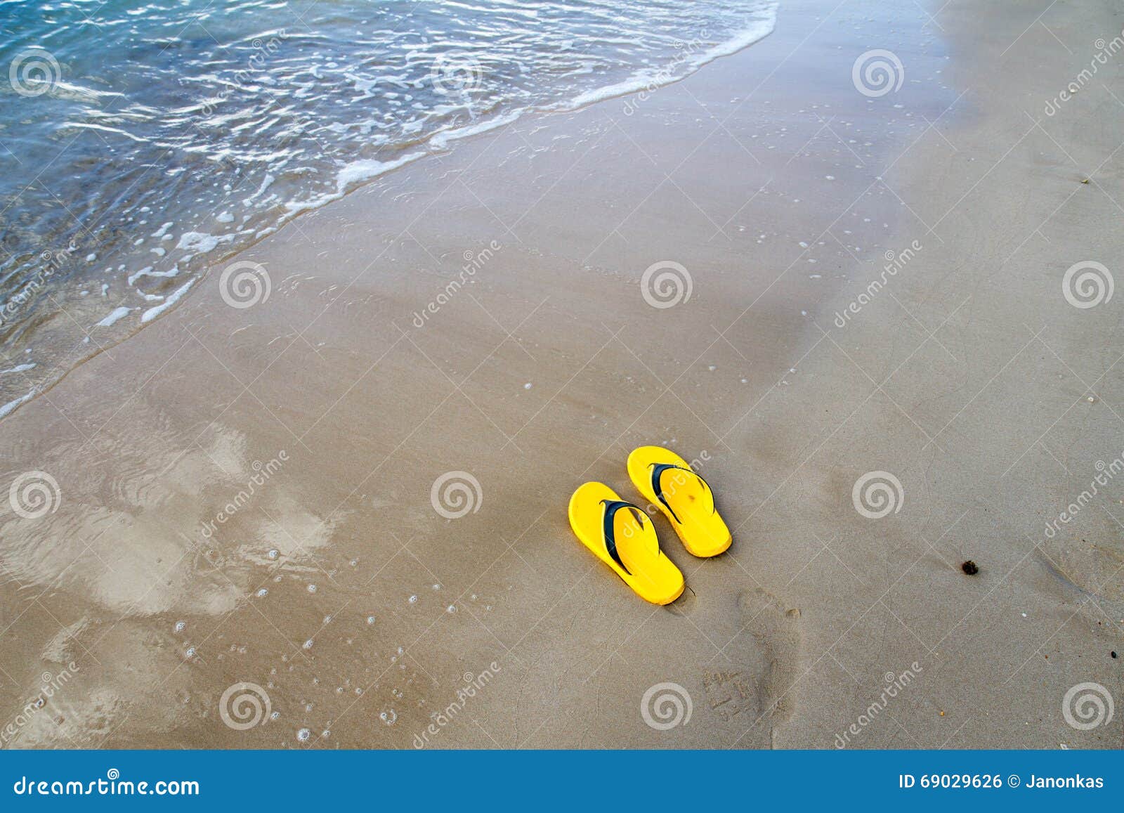 Yellow Slippers on the Sand Beach Stock Photo Image of flops, sandals