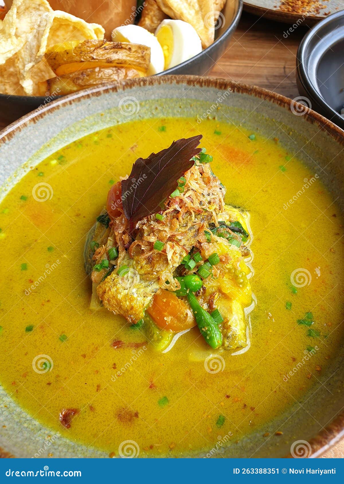 Yellow snapper soup stock image. Image of food, chef 263388351